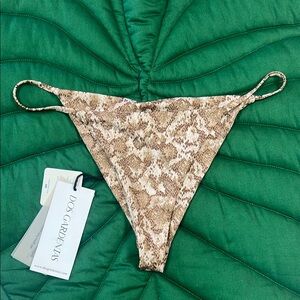 NWT Dos Gardenias string bikini bottom, snake skin. Size 4. Color: Medusa